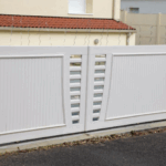 White driveway gate enhancing home security and property value in Texas.