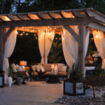 Cozy cedar pergola with string lights and outdoor seating in Fort Worth backyard