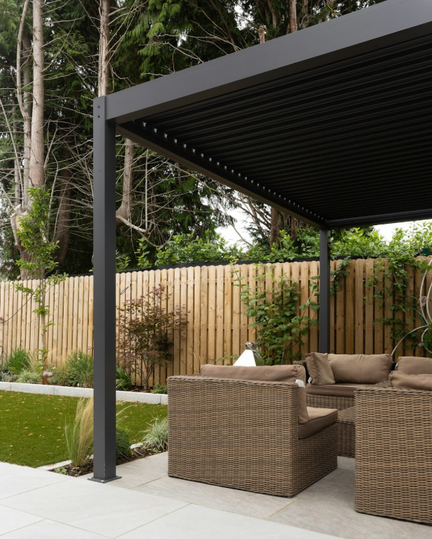 Cedar pergola with wicker patio furniture in Fort Worth backyard