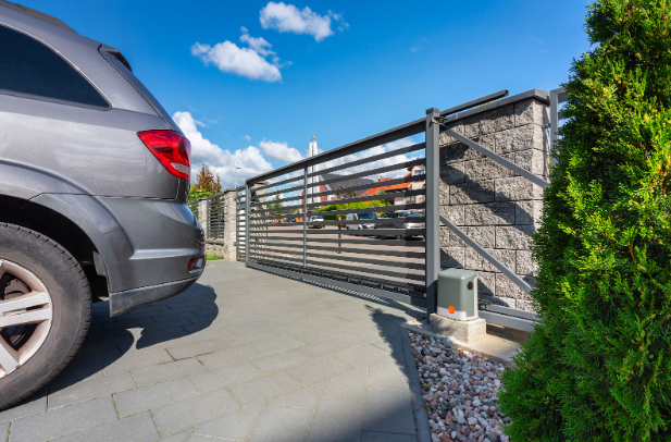 Weather-resistant electric gate for Texas homes by Texas Patio and Fence
