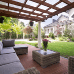 Custom wood arbor providing shade over a Fort Worth backyard patio